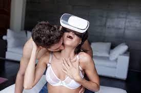 10 Hot Sex Trends of 2025 - A couple using VR headsets for a playful intimate experience