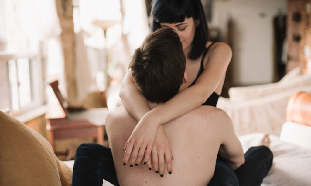 A couple practicing tantric touch and breathwork